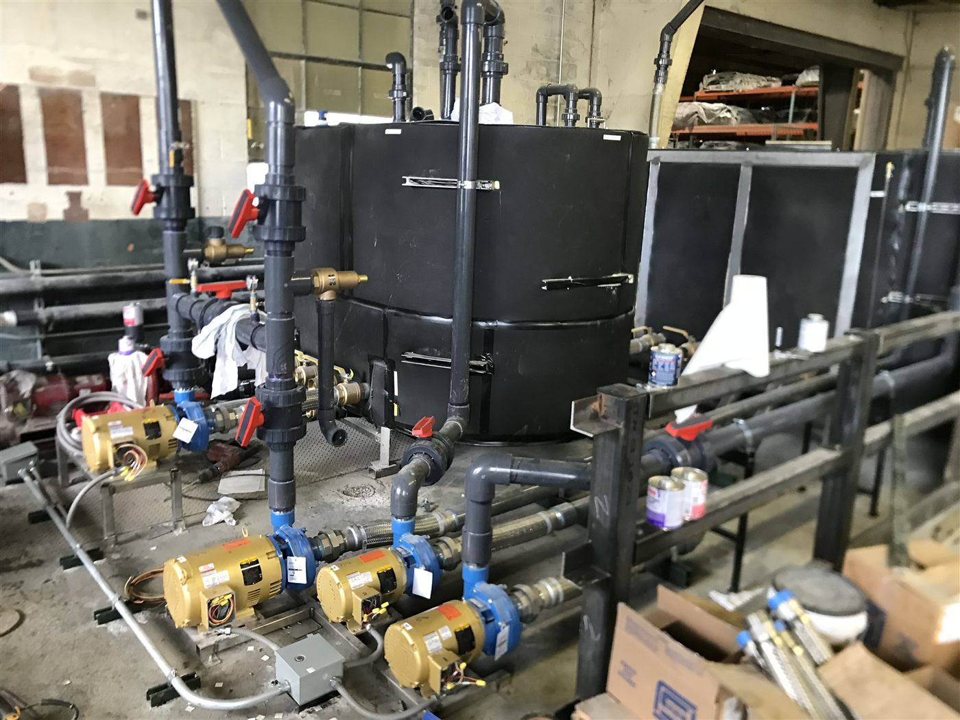 Pump, tank, and piping for an industrial cooling and plant-utility system