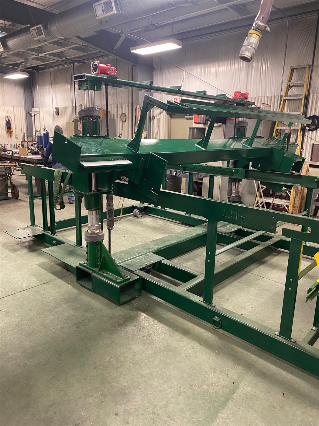 Welded steel machine frame in the shop